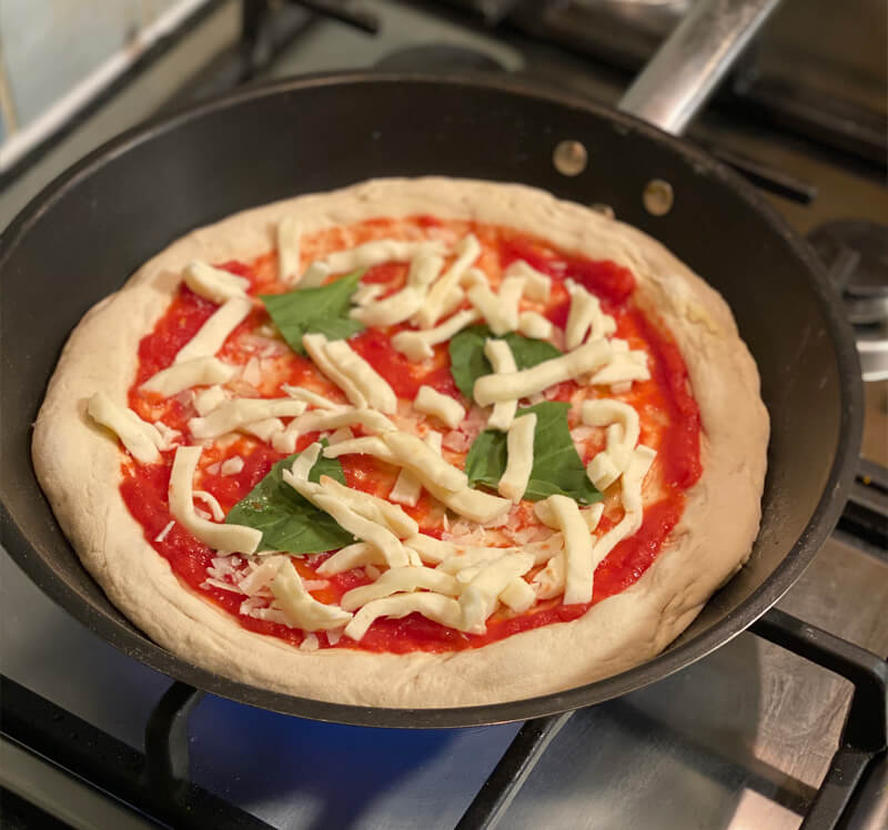 heating pizza in frying pan
